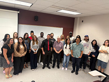 Students in Professor Carol Walther's Gender and Crime course posing for a group photo